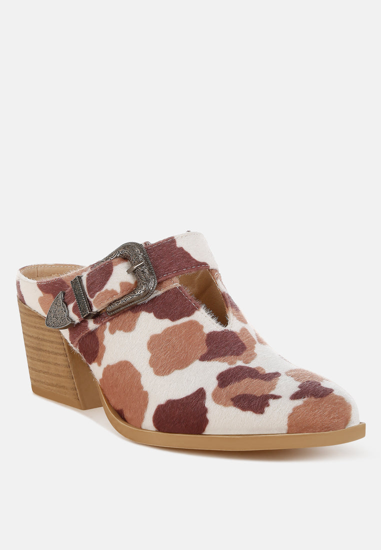 nometa faux suede buckle detail mules#color_cow print