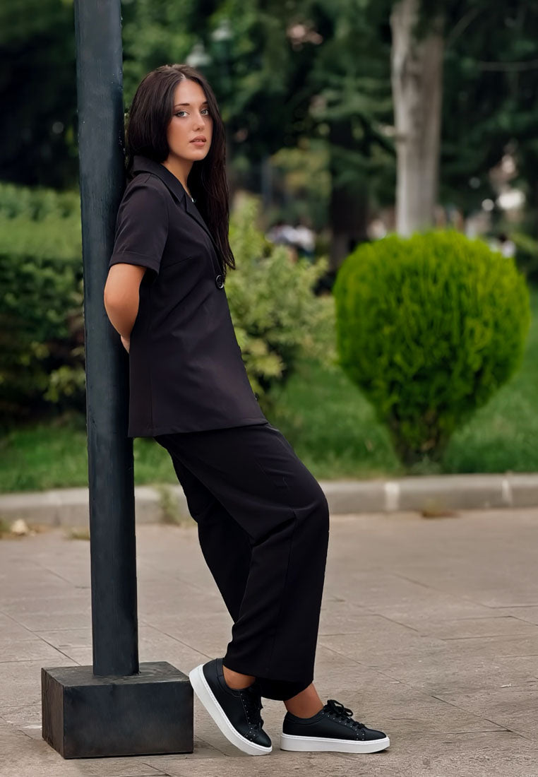 strider studs embellished chunky sneakers#color_black