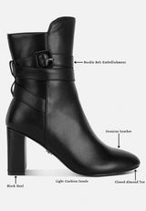 Cobra Buckle Strap Embellished Boots In Black#color_black
