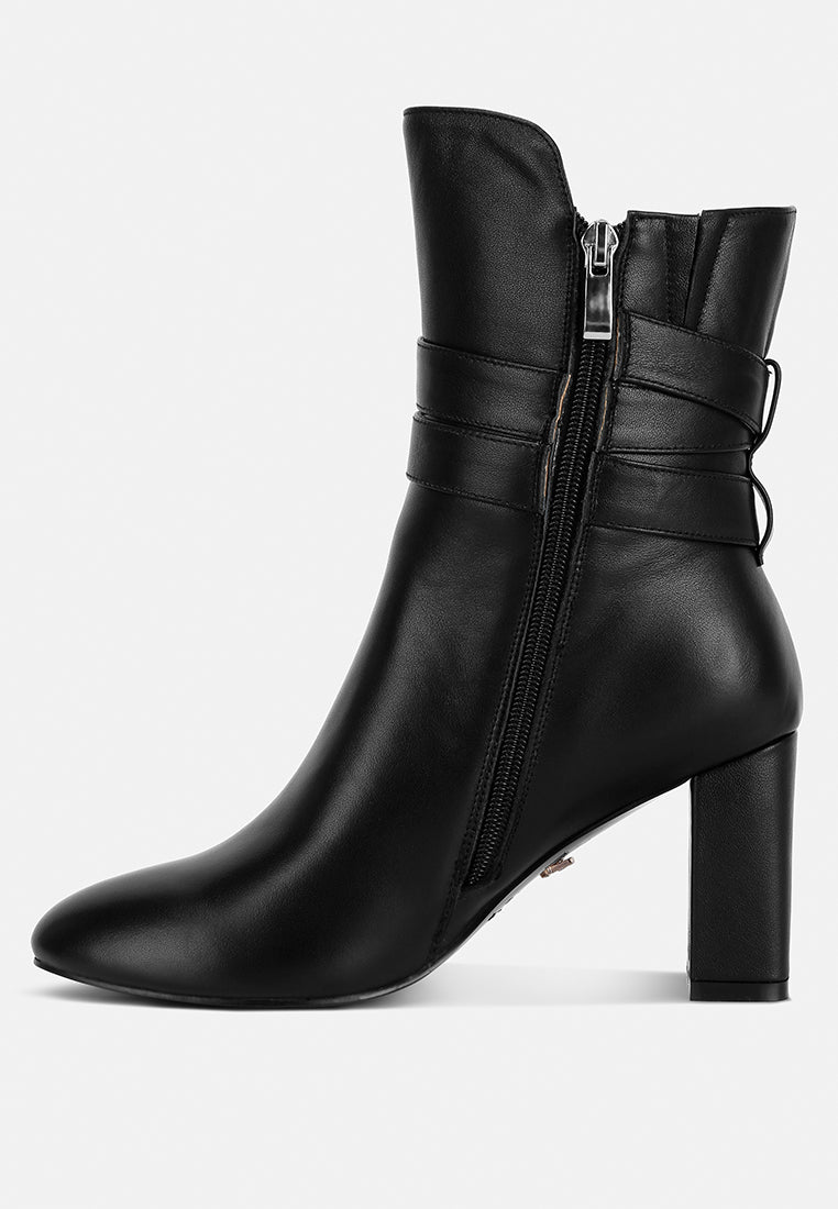 Cobra Buckle Strap Embellished Boots In Black#color_black