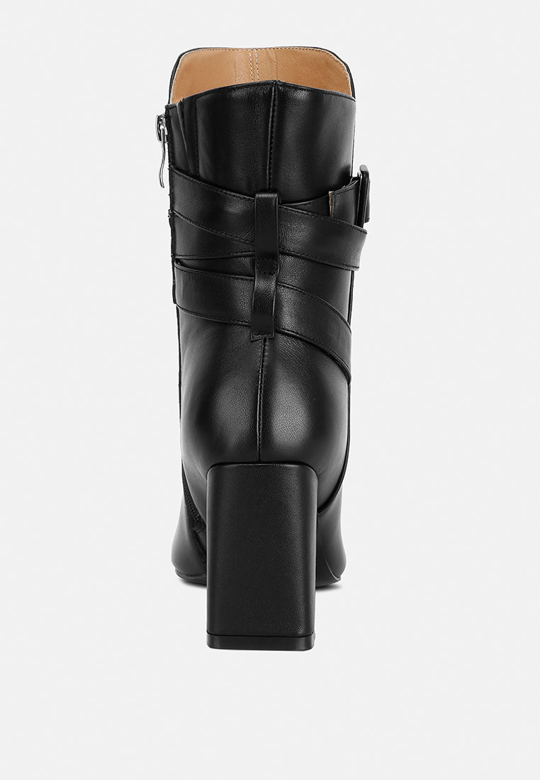 Cobra Buckle Strap Embellished Boots In Black#color_black