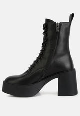 Carmac High Ankle Platform Boots In Black#color_black