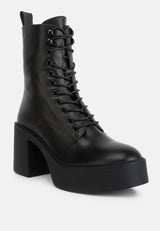 Carmac High Ankle Platform Boots In Black#color_black
